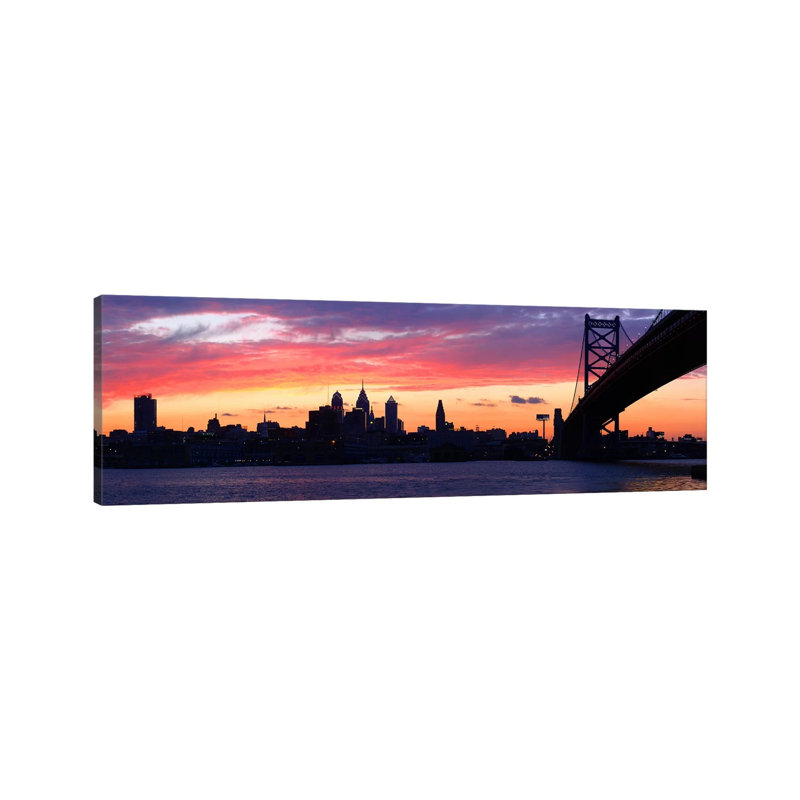 Silhouette Of A Suspension Bridge Across A River, Ben Franklin Bridge - Wrapped Canvas Panoramic Print