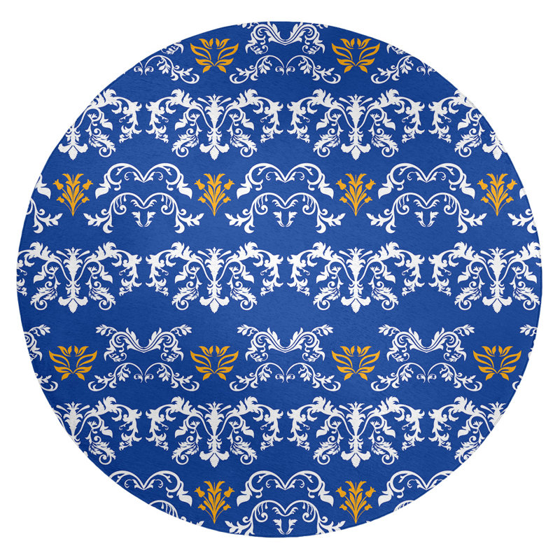Tapis rond bleu damassé à motif baroque