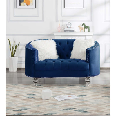 Charming Velvet Loveseat for Relaxing and Entertaining, Enhancing Living Room Ambiance.