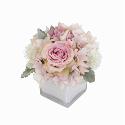 Arrangement floral hortensia en vase roses