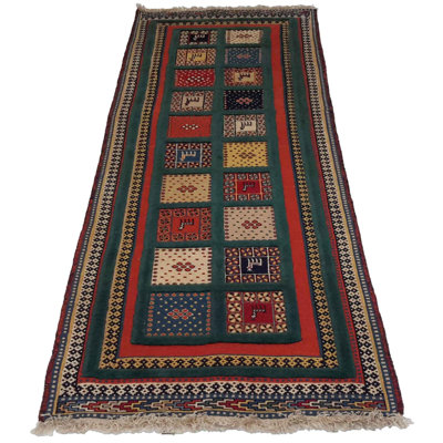 Aryiel Oriental Area Rug in Green
