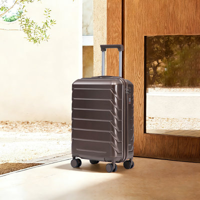 Bagage à carreaux rigides en ABS de 20 pouces avec surface résistante aux égratignures, quatre roues multidirectionnelles et serrure à combinaison intégrée pour un déplacement sûr, léger et maniable.