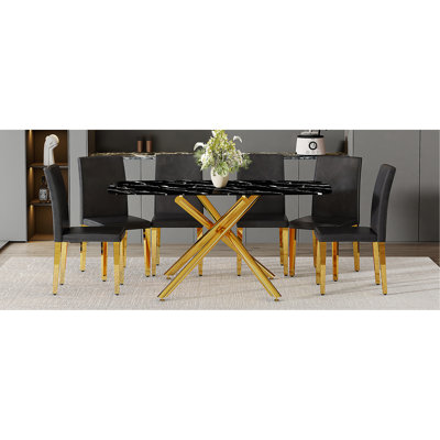 Table and chair set.63"x35.4" Luxurious Black Marble-Patterned Tempered Glass Dining Table.Single Fork Golden Metal Table Legs.Paried With 6 Black PU dining chairs,Simple and versatile.