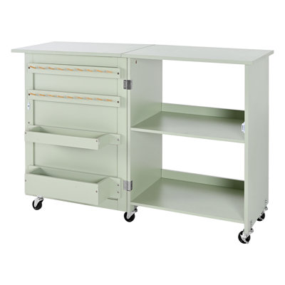 Table de couture pliante, table de machine à coudre polyvalente avec un design compact, roues, chevilles en bois, plateaux de rangement et tablette, serrure de porte magnétique, station de bricolage et bureau d'appoint pour la maison
