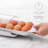 YouCopia® FridgeView Rolling Egg Holder, Stackable Egg Carton for Fridge Storage