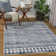 Addilee Geometric Dark Blue Area Rug