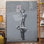 Graffiti Is A Crime by Banksy - Wrapped Canvas Print