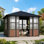 Berkely 12 pi x 12 pi Pavillon de jardin en aluminium avec toit rigide et toit en aluminium avec support pour téléviseur et prise de charge