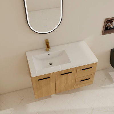 Ensemble de meuble-lavabo mural simple 36 po avec lavabo supérieur en résine gauche, meuble-lavabo flottant avec porte à fermeture en douceur et tiroirs