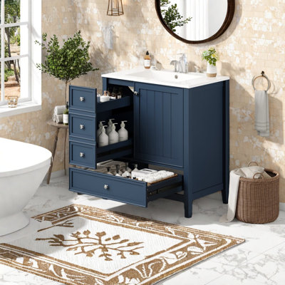 Dans un meuble-lavabo bleu (doit inclure le meuble-lavabo et le lavabo)