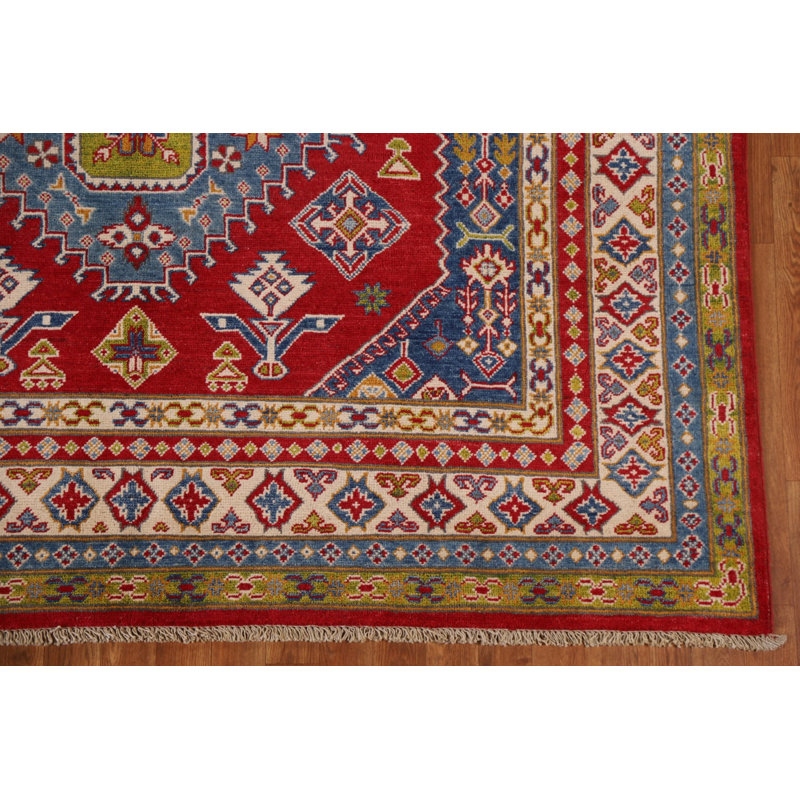 Tapis rouge à motif oriental Kazak