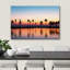 «Tropical Sunset Silhouetted Palms» sur toile-99543781