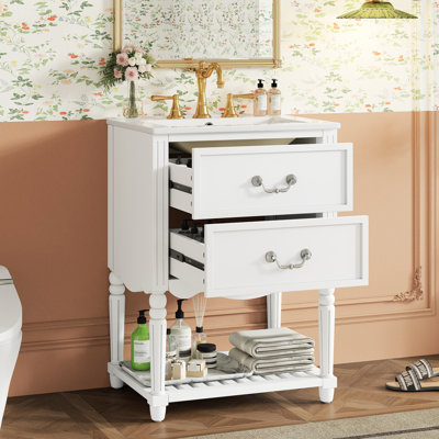 Meuble-lavabo blanc 24 po avec lavabo en céramique, design rétro, deux tiroirs à fermeture en douceur, tablette ouverte pour rangement organisé et installation rétro élégante à dossier ondulé de 24 po