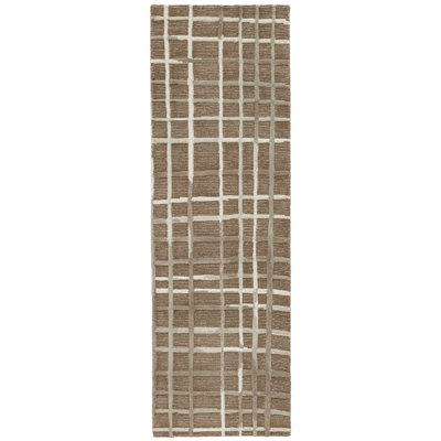 Tapis polychrome touffeté à la main