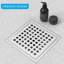 Tuile dans le drain de douche-62452324