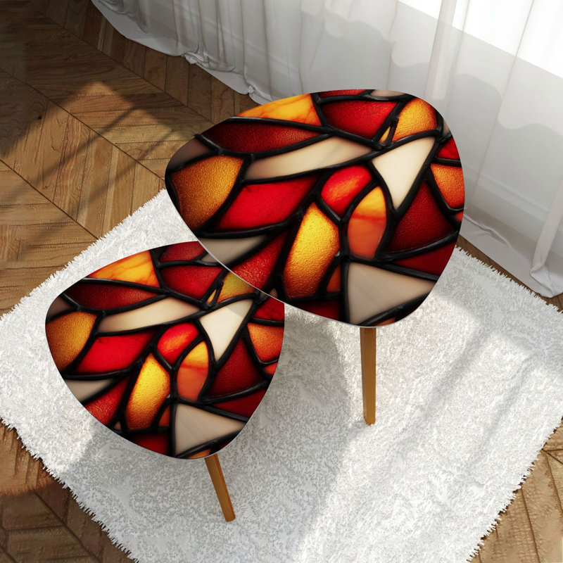 Ensemble de 2 tables basses gigognes abstraites en verre teinté rouge orange et orange