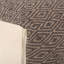 Pouf en coton tissé à la main Amuleto avec un motif de diamant subtil, parfait pour des sièges élégants et confortables