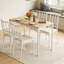 Ensemble de table de salle à manger Kaelvora avec chaises rembourrées en polyuréthane et structure en métal-330961533