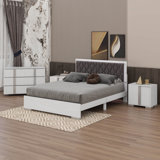 Ensemble de chambre à coucher 4 pièces avec grand lit tapissier avec tables de chevet et commode en miroir