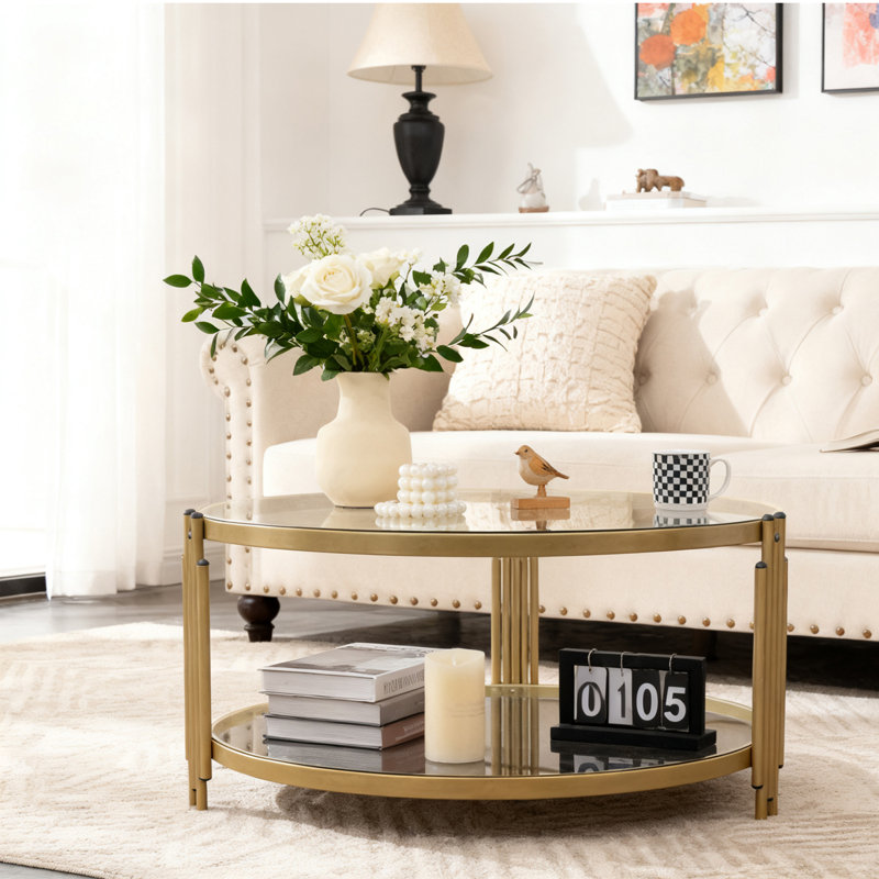 Table basse ronde en verre double plateau de 88 cm (34,6 pouces) avec espace de rangement et structure en métal doré de style luxueux.