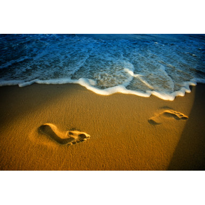 " Footprints On Beach " by Idealphoto30