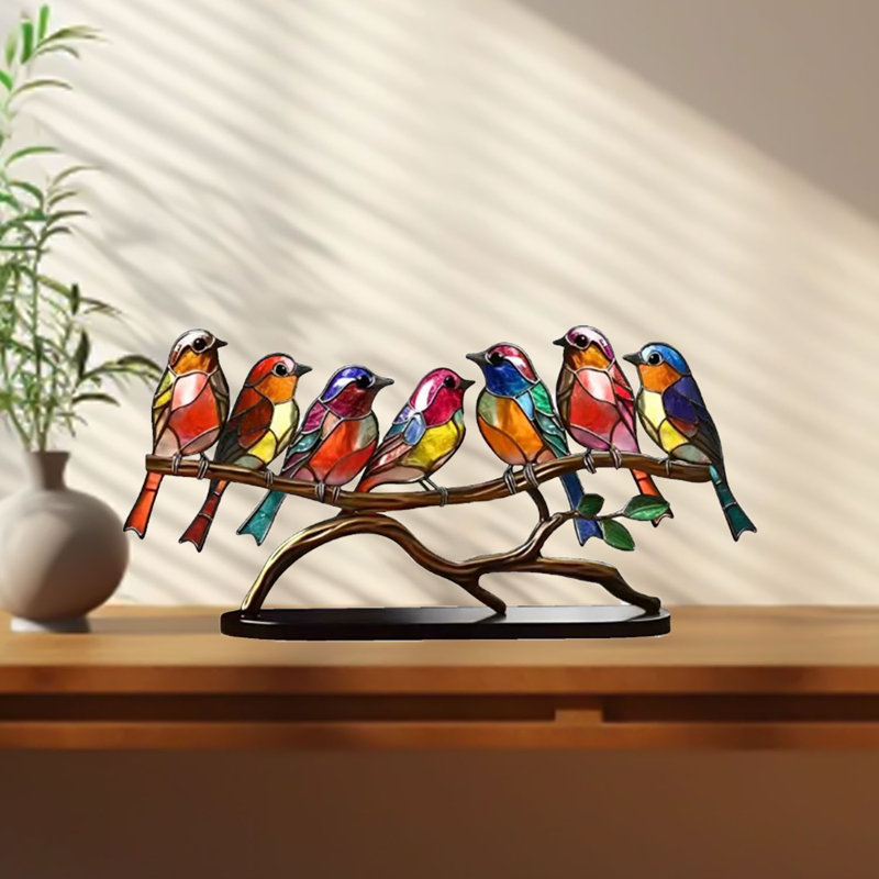 Figurine d'oiseau en acrylique sur une branche