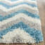 Tapis à motif chevron ivoire / bleu / g ris-15105634