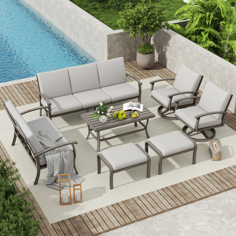 Ensemble de conversation de patio 7 pièces en aluminium avec table basse, table de bout, repose-pieds et coussins gris clair