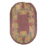 Nancylou Wool Floral Area Rug in Purple