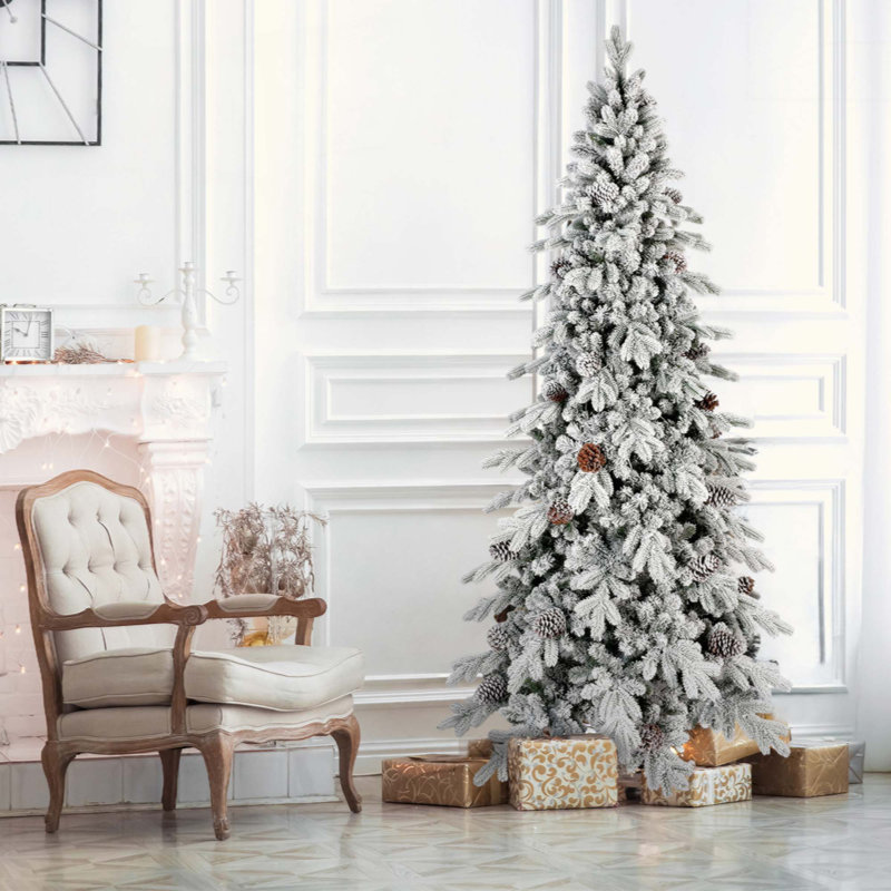 Arbre de Noël en flocage PE / PVC avec 40 pommes de pin naturelles - 1424 pointes, conception peu encombrante, branches articulées, support en métal stable, aspect enneigé réaliste