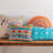 Mirage Orange Peacock Round Pillow