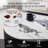 Modern Drum Coffee Table With 2 Solid Wood Drawers, Engineered Stone Tabletop & Fluted Base