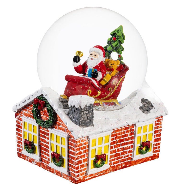 Globe terrestre en résine Père Noël en traîneau avec base maison
