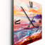 Horloge murale bateau sur l'océan pendant un coucher de soleil vibrant-1345213019