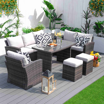 Nyshae 8 - Person Patio Dining Set with Rectangular Table , Cushions Included
