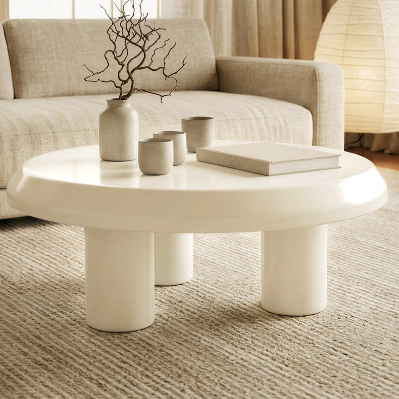 Table basse d'intérieur crème avec table basse et 3 pieds pour le salon