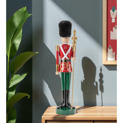 19" Black Red And Green Resin Christmas Nutcracker Tabletop Sculpture