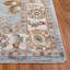 Tapis oriental en polyester bleu / ivoire Xanthi-128544300