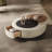 Rotating cream style end table