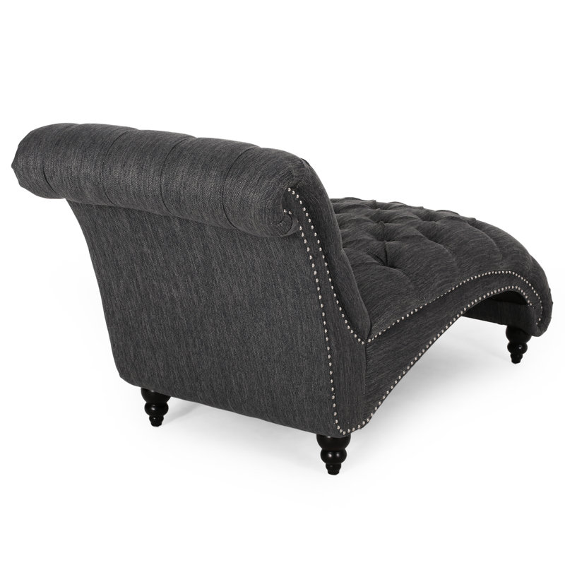 Chaise longue relaxante, courbée avec capitonnage à boutons et coutures en losange, siège gris anthracite, pieds en bois de bouleau élégamment cousus, revêtement en tissu, stable