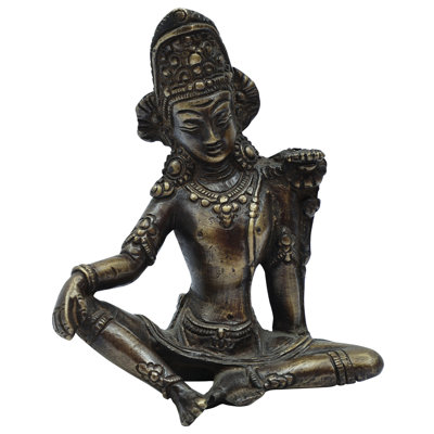 Figurine la tête abaissée