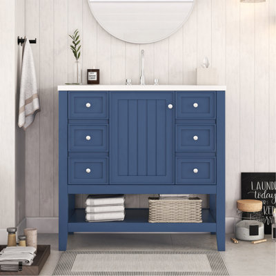 Meuble-lavabo élégant avec lavabo, tiroirs et armoire pour un décor de salle de bain fonctionnel et élégant.