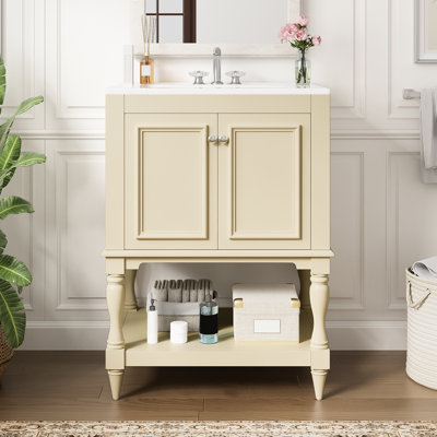 Meuble-lavabo de 24 po avec dossier ouvert pour un entretien facile et pieds d'armoire profilés en céramique