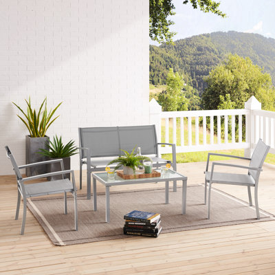 Athalie 4-Person Cooling PVC-coated polyester & Metal Outdoor Patio Seating Set with Loveseat, Chairs, and Glass-Top Table