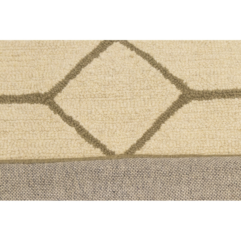 Tapis beige en laine touffeté à la main à motif géométrique
