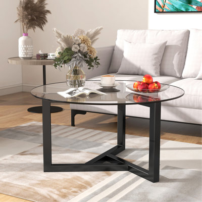 Table basse ronde en verre de style moderne avec plateau en verre trempé et base en bois robuste