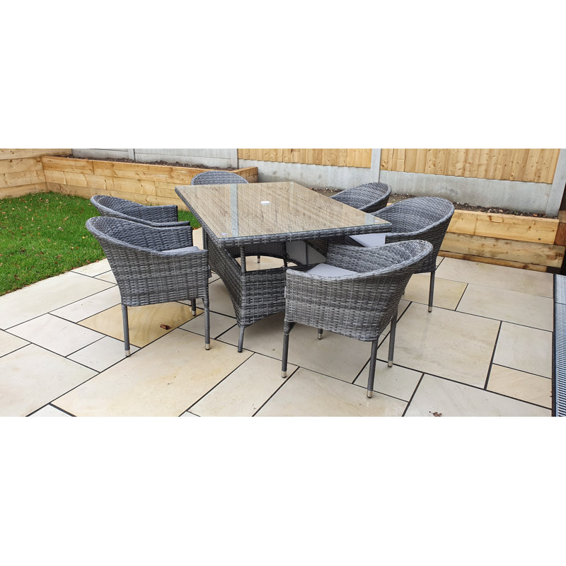 Lilia 6 - Person Wicker Patio Dining Set with Rectangular Table , Cushions Included