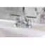 Robinet de salle de bain central à 4 poignées à 3 trous avec bonde escamotable Kingston Brass Kingston-95752645