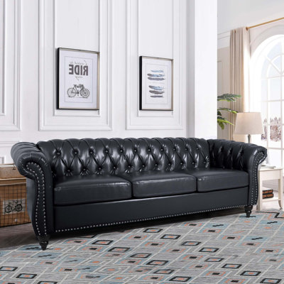 Deaneen 83.85'' Faux Leather Sofa