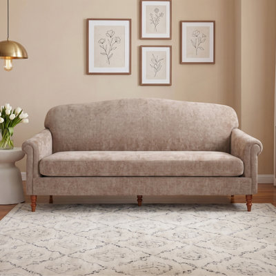 Canapé moderne avec accoudoirs roulés et revêtement en chenille